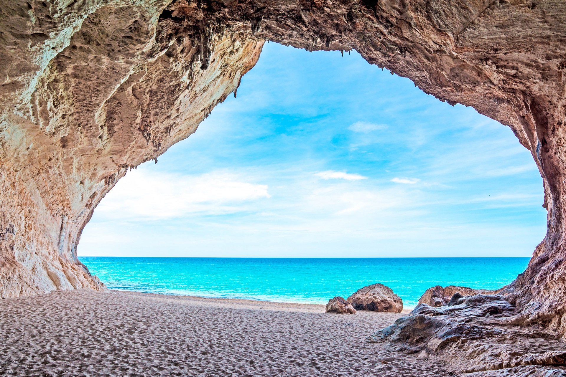 Quien eres tu? (Ororo) Cala-Luna-cave-by-the-sea-Sardinien-Italien-Italy-shutterstock_192510971-2